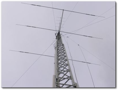 My aluminum tower for the low band yagi. It also host a 10 el horisontal yagi for 144MHz, a 6 element vertical yagi for 144, a vertical dipole for 144 and a vertical dipole for 432. Then some of my wire antennas use this as a guide.